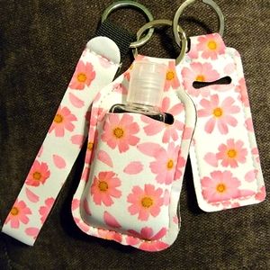 Travel hand sanitizer and chapstick holder